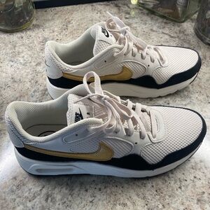 Nike White and Gold Athletic Shoes 9.5